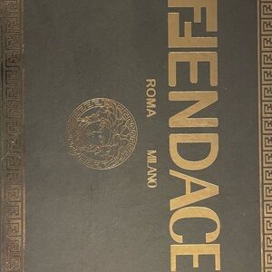 Fendi Black Slides with Gold Detailing